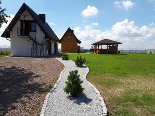 Лоджи Domki Podwiatracze Krajno Pierwsze Семейный двухуровневый номер с видом на горы-1