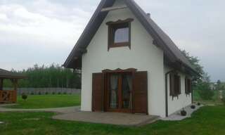 Лоджи Domki Podwiatracze Krajno Pierwsze Семейный двухуровневый номер с видом на горы-14